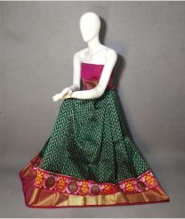 Pine Green and Golden ikkat lehengas with all over pochampally ikkat design