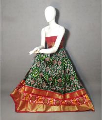 Dark Green and Tomato Red ikkat lehengas with all over pochampally ikkat design