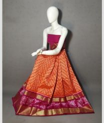 Orange and Neon Pink ikkat lehengas with all over pochampally ikkat design