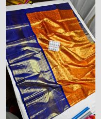 Orange and Navy Blue kanchi lehengas with All over design