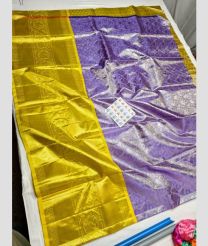 Lite Purple and Golden yellow kanchi lehengas with All over design