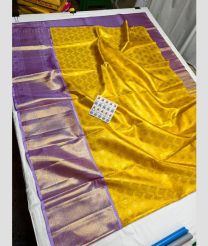 Yellow and Lavender kanchi lehengas with All over design
