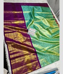 Turquoise and Dark Magenta kanchi lehengas with All over design