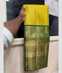 Yellow and Green kanchi lehengas with all over jari design