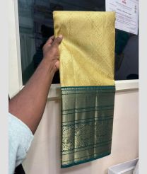 Lite Golden and Teal kanchi lehengas with all over jari design