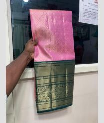 Rose Pink and Dark Teal kanchi lehengas with all over jari design