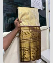 Cream and Brown kanchi lehengas with all over jari design