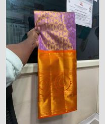 Purple and Orange kanchi lehengas with all over jari design