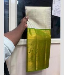 Half White and Parrot Green kanchi lehengas with all over jari design