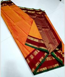 Orange and Green kanchi pattu sarees with Gap Border design