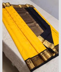 Yellow and Black kanchi pattu sarees with Koravai Border design