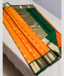 Lite Orange and Green kanchi pattu sarees with Koravai Border design
