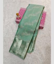 Turquoise Green and Silver kanchi pattu sarees with All over brocade design