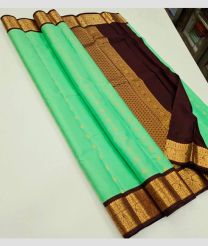 MediumSpringGreen and Chocolate kanchi pattu sarees with Kuttu Border design