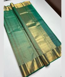 Teal and Golden kanchi pattu sarees with All over brocade design