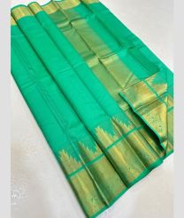 Turquoise and Godlen kanchi pattu sarees with Temple Border design