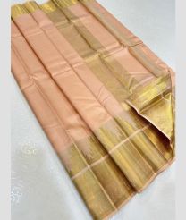 Cream and Golden kanchi pattu sarees with Temple Border design