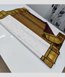 White and Maroon kanchi pattu sarees with All over Buttas design