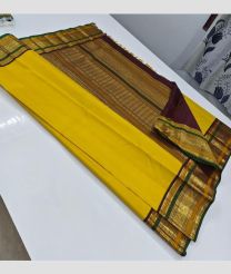 Yellow and Maroon kanchi pattu sarees with All over Buttas design