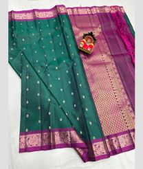 teal and purple colour kanchi pattu sarees with All over Buttas design