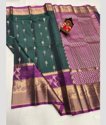 dark green colour kanchi pattu sarees with All over design