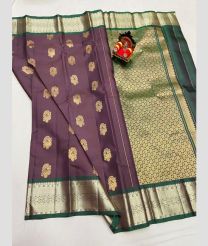 purple and silver colour kanchi pattu sarees with All over Buttas design