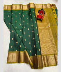 green and olive green colour kanchi pattu sarees with All over Buttas design