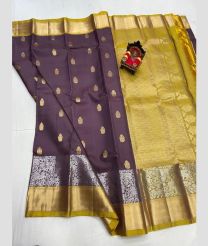 olive and purole colour kanchi pattu sarees with All over Buttas design