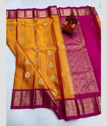 brown and magenta colour kanchi pattu sarees with All over Buttas design