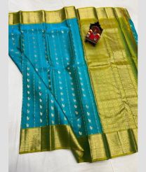 blue and olive green colour kanchi pattu sarees with All over Buttas design