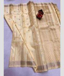 cream colour kanchi pattu sarees with All over Buttas design