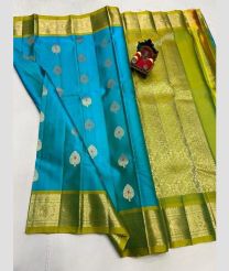 cyan and olive green colour kanchi pattu sarees with All over Buttas design