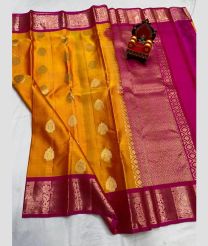 orange colour kanchi pattu sarees with All over Buttas design