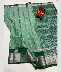 silver and light green colour kanchi pattu sarees with All over design
