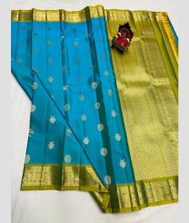 cyan blue and olive colour kanchi pattu sarees with All over Buttas design