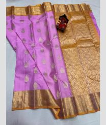 pink and brown colour kanchi pattu sarees with All over Buttas design
