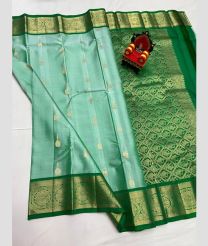green and light blue colour kanchi pattu sarees with All over Buttas design