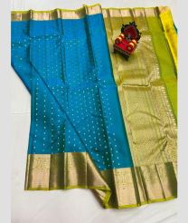 blue and olive colour kanchi pattu sarees with All over Buttas design