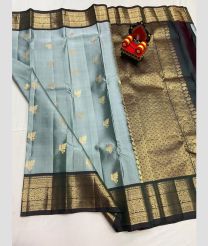 light blue colour kanchi pattu sarees with All over Buttas design