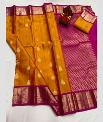 brown and magenta colour kanchi pattu sarees with All over Buttas design