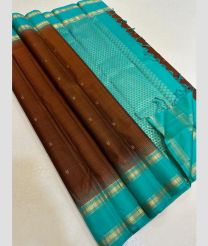 brown colour kanchi pattu sarees with All over Buttas design