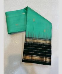 blue colour kanchi pattu sarees with All over Buttas design