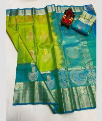 olive green colour kanchi pattu sarees with All over Buttas design