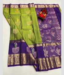 green and purple colour kanchi pattu sarees with All over Buttas design