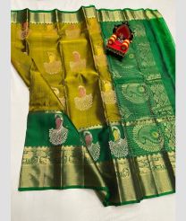 green and olive green colour kanchi pattu sarees with All over Buttas design