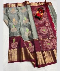 gray and purple colour kanchi pattu sarees with All over Buttas design
