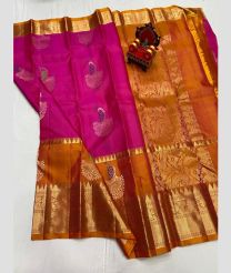 brown and purple colour kanchi pattu sarees with All over Buttas design