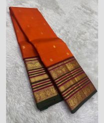 maroon red colour kanchi pattu sarees with All over Buttas design