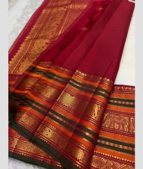 magenta red colour kanchi pattu sarees with All over Buttas design
