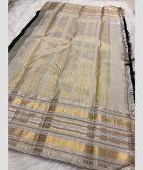 silver colour kanchi pattu sarees with All over Buttas design